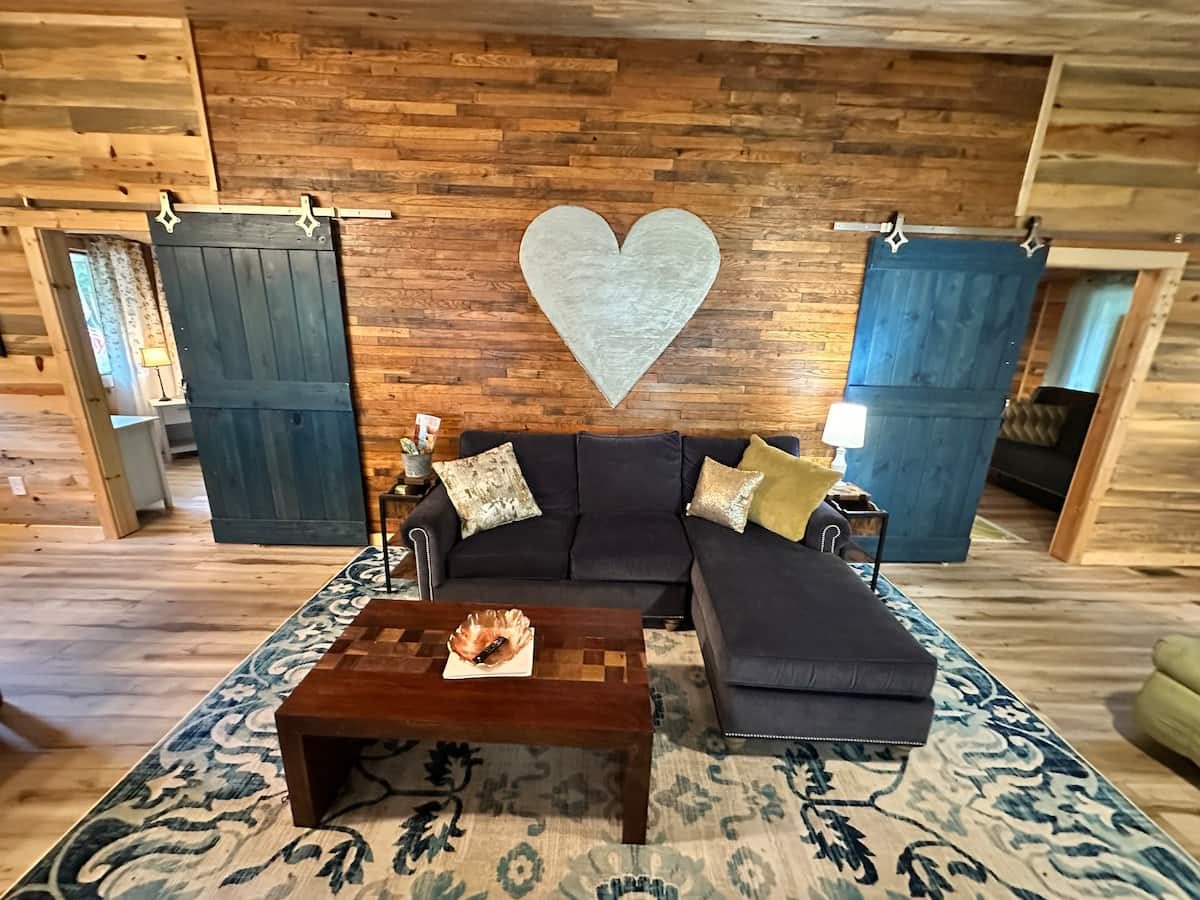 Wood-paneled cabin living room