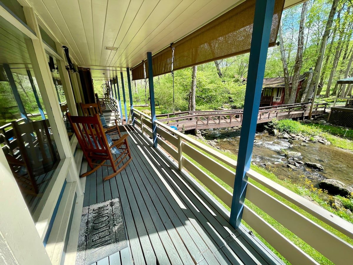 Covered porch above the creek
